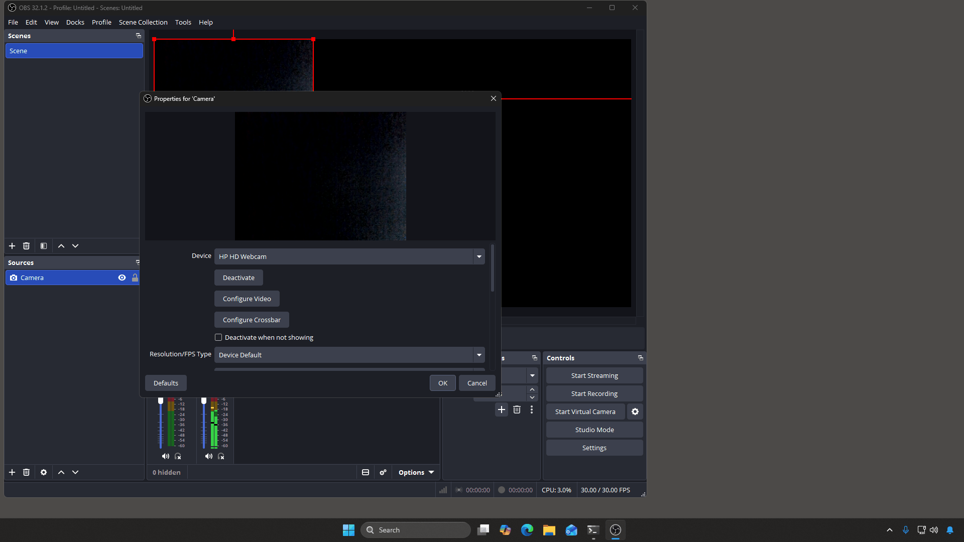 The Properties dialog for a camera source with the Device dropdown showing a webcam