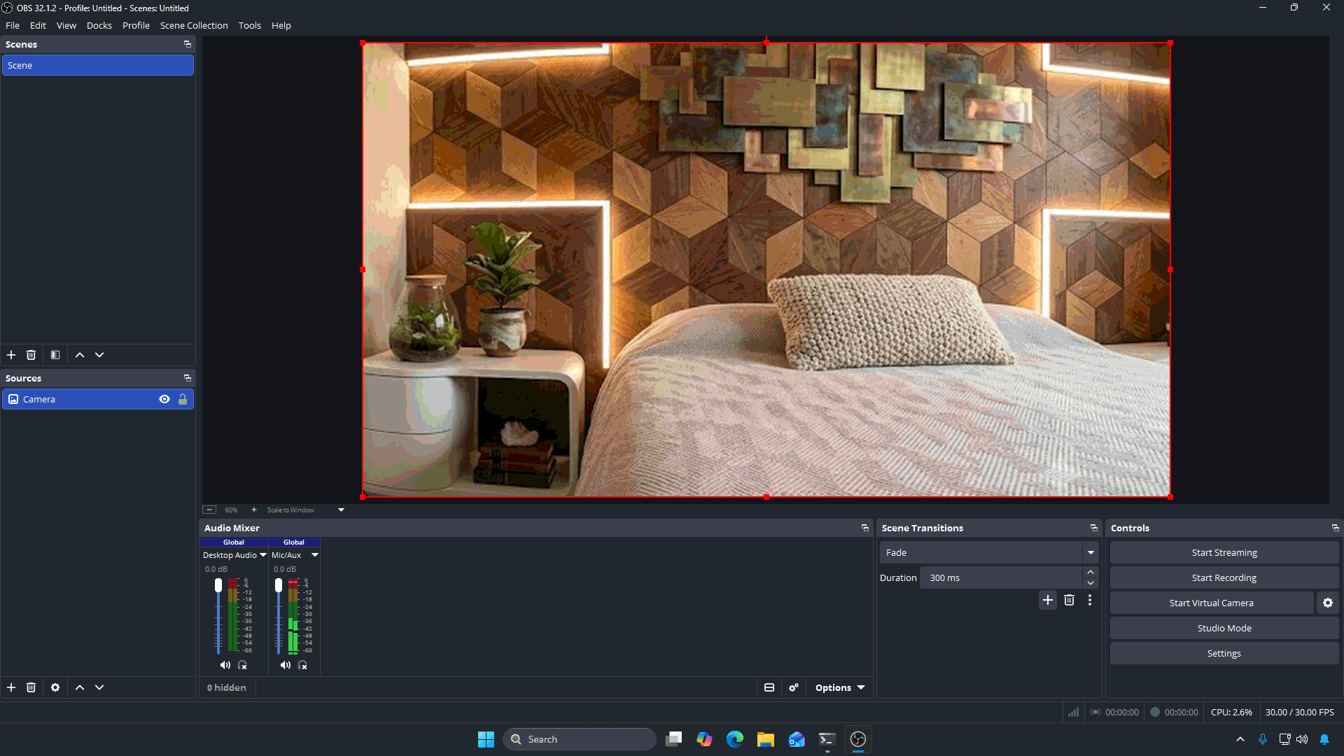 OBS ready to go live: video in the preview, audio meters moving, Start Streaming in the Controls panel
